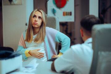 Pregnant Woman Complains to Obstetrician about Health Issues. Mother to be asking for medical...