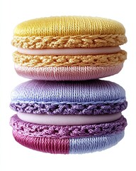 Colorful macaron cookies stacked together.