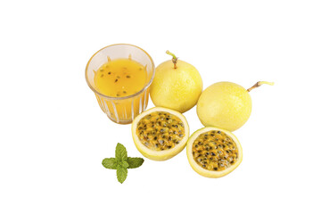 Fresh Passion Fruit with Golden Juice Glass and Mint on White Background