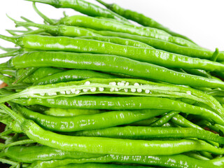 Fresh Green Chili Peppers Bundle with Wire Ties on White Background