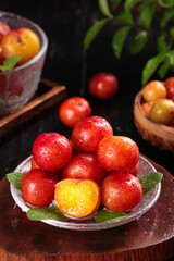 Fresh Red Plums with Water Droplets on Glass Plate - Organic Stone Fruit Display