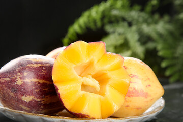 Fresh Ripe Persimmon Fruit Cut Open Showing Golden Flesh and Natural Segments