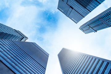 Office tall building. Low angle view of skyscrapers modern office building city in business center...