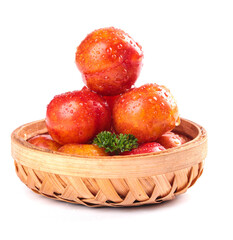 Fresh Red Strawberries with Water Drops in Woven Basket on White Background