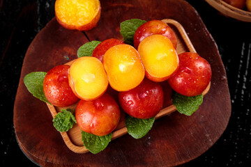 Fresh Red Yellow Plums Wooden Bowl Mint Leaves Guangdong Stone Fruit Arrangement