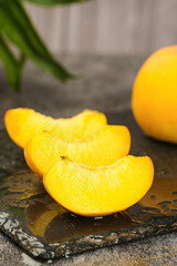 Golden Peach Slices on Slate Board - Fresh Fruit Still Life