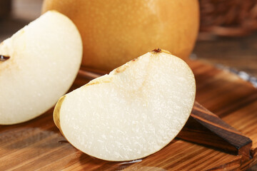 Fresh Golden Asian Pears Sliced on Wood Board - Juicy Shandong Variety Fruit