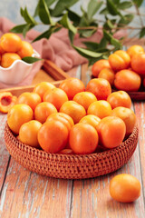 Fresh Apricots in Wicker Basket on Wooden Table - Organic Stone Fruit Harvest