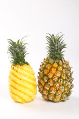 Hand-torn Fresh Pineapple with Crispy Yellow Flesh on White Background