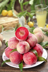 Fresh Red Peach Fruit Guangshui Chinese Cinnabar Variety on Plate Summer Harvest Organic Food