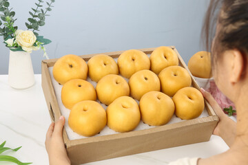 Fresh Golden Yellow Pears in Wooden Box - Healthy Organic Fruit Delivery at Home