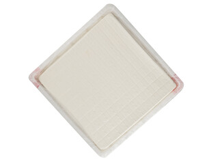 Fresh White Tofu Block in Plastic Package Isolated on White Background