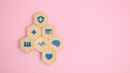 Healthcare and Wellness Icons on Wooden Blocks, Medical and Mental Health Concept