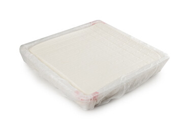 Fresh White Tofu Block in Plastic Packaging Isolated on White Background