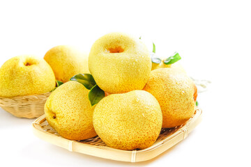 Fresh Dangshan Pears from Anhui China in Bamboo Baskets on White Background