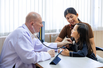Caucasian doctor is diagnosis young girl using stethoscope for lung checkup and side effect on...