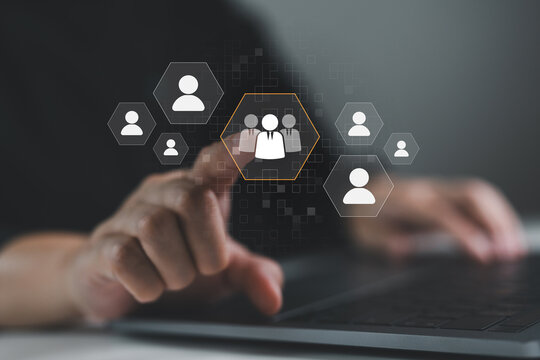 Finger pointing at business team icon, human resources, digital recruitment, staff management, employee selection and HR systems in modern business. Smart hiring system, workforce planning concept.