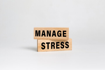 manage stress words text on wooden blocks isolated on white background