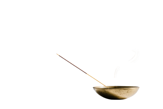 Minimalist golden incense burner bowl with a single stick.