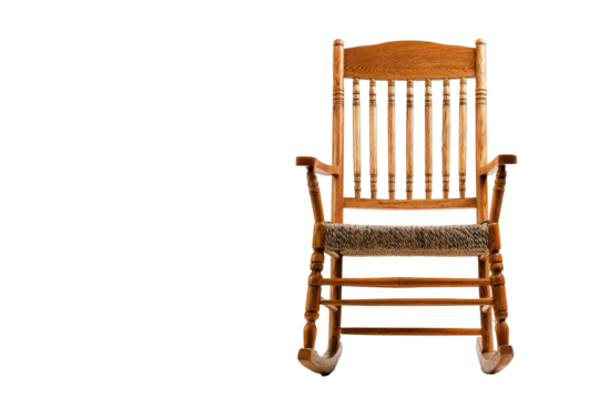Classic wooden rocking chair with a woven seat isolated.