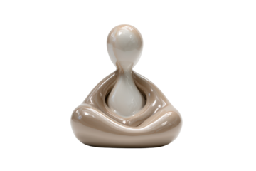 Abstract ceramic figurine of a person in a meditation pose.