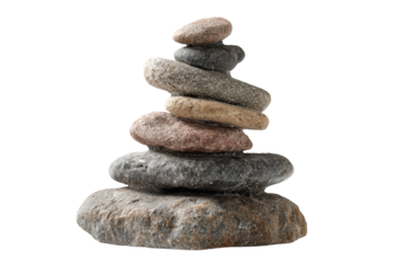 A tower of carefully balanced natural stones on a white background.