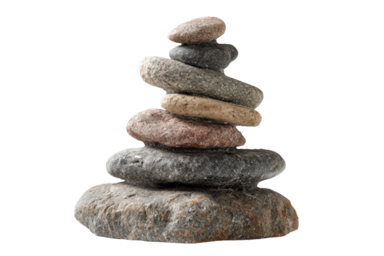 A tower of carefully balanced natural stones on a white background.
