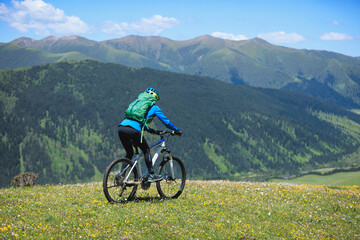 Riding mountain bike in the beautiful mountains