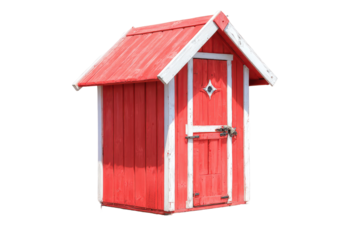 Small red wooden outhouse with white trim isolated.