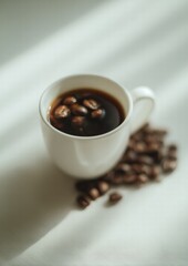 Obraz premium A Cup of Coffee with Beans and Bokeh on Bright Background, High-key Lighting, Soft Shadows, Professional Still Life, for Cafe Menu, Advertising, and Lifestyle Blog Content
