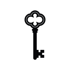 Vintage ornate black key silhouette on white background