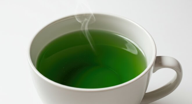 Steaming Green Herbal Tea in White Mug