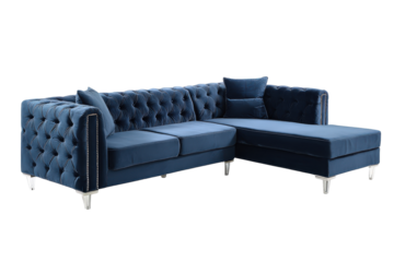 Luxurious deep blue tufted velvet sectional sofa with chaise lounge.
