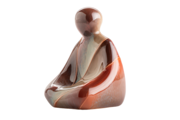Abstract polished stone figurine in a meditative pose.