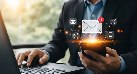 Modern email communication business technology concept with mobile and laptop integration