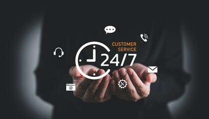 Hands holding twenty four seven customer service, nonstop support, online helpdesk, live chat, email, call center and digital customer care solutions. Omnichannel helpdesk and communication system.
