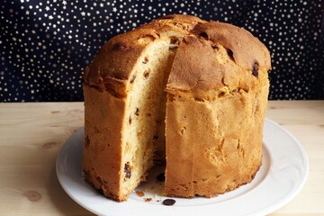 Easter cake with raisins on a white plate