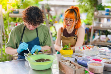 Young Asian Gen Z Men and Women Attending a Workshop on Cactus Gardening for Environmental Care