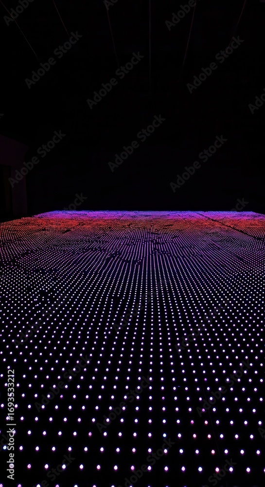 Poster a large expanse of lights with a gradient of vibrant hues, creating a mesmerizing visual effect.