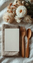 Fototapeta premium Elegant Menu Mockup with Wooden Utensils and Flowers