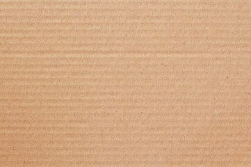 Cardboard sheet texture background, detail of recycle brown paper box pattern.