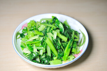 Stir-fried vegetables commonly prepared in Chongqing, China