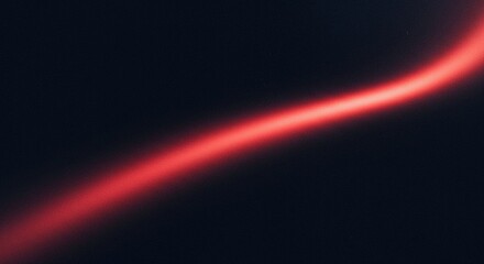 The Abstract Flow of a Vibrant Red Light Across the Deep Dark Background