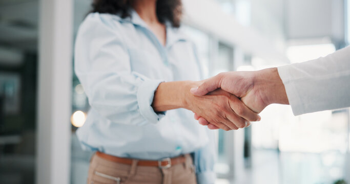 Business, welcome and people shaking hands in office for finance merger, b2b contract or partnership. Financial team, investor and handshake at firm for stakeholder approval, company growth and offer