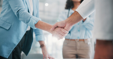 Business, deal and people shaking hands in office for b2b agreement, finance partnership or...