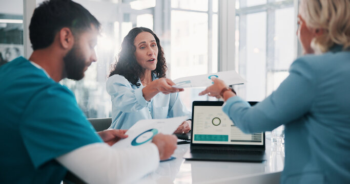 Hospital, meeting and people on laptop with documents for finance report, budget and funding. Healthcare, team and workers with graph, statistics and paperwork for insurance, medical grant or revenue