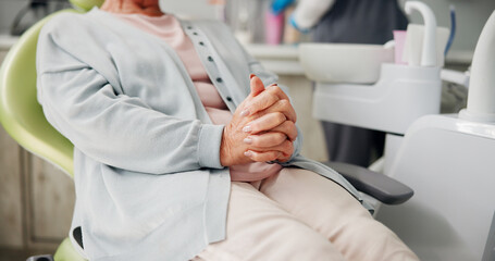 Woman, patient and hands stress for dental surgery, tooth extraction or pain relief at clinic. Checkup, female person and waiting in anticipation with anxiety, fear or nervous for dentist on chair