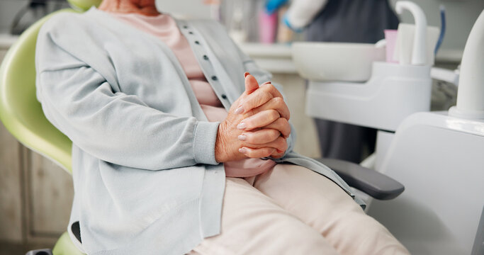 Woman, patient and hands stress for dental surgery, tooth extraction or pain relief at clinic. Checkup, female person and waiting in anticipation with anxiety, fear or nervous for dentist on chair