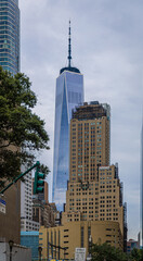 One World Trade Center skyscraper in New York City framed by surrounding buildings