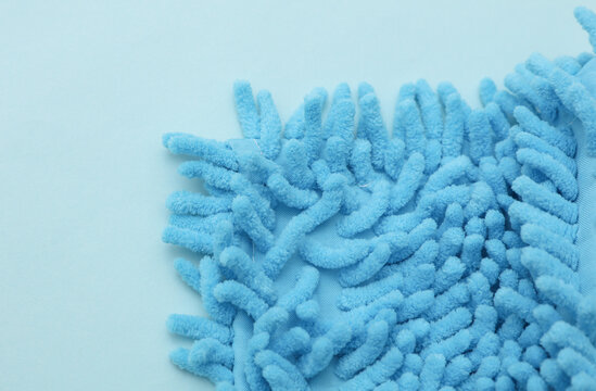 Blue shaggy mop cloth close up
